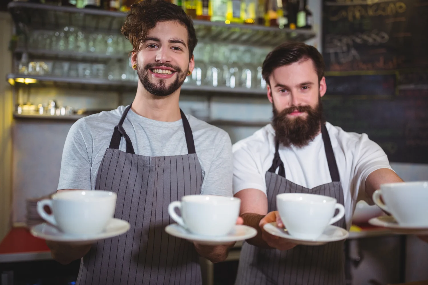 Happy restaurant staff with Tableo
