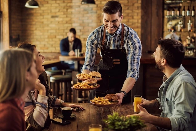 happywaiterservingfoodgroup | Tableo happy waiter serving food group