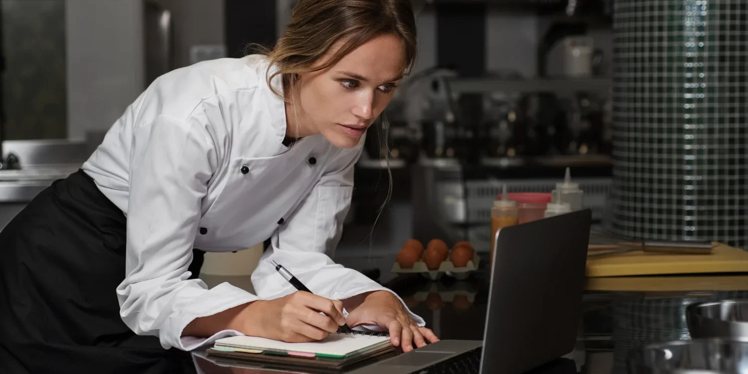 Staff checking restaurant analytics